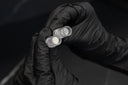 Close-up of microchanneling facial device tip used in advanced facial treatments near me.